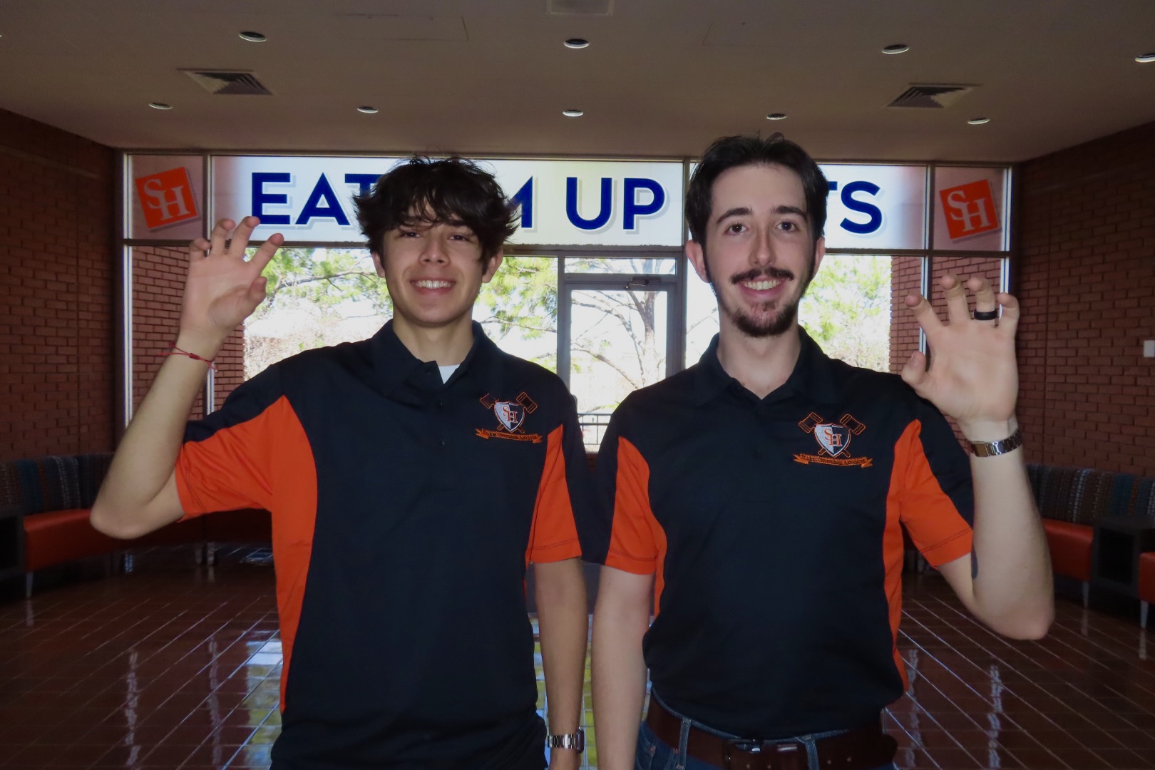 Two SGA members showing their Bearkat Spirit